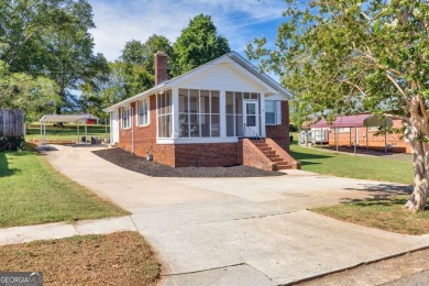 Charming and full of character, this historic 4-sided brick on Chicopee Woods Golf Course in Georgia - for sale on GolfHomes.com, golf home, golf lot