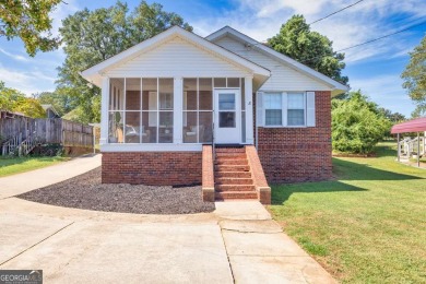 Charming and full of character, this historic 4-sided brick on Chicopee Woods Golf Course in Georgia - for sale on GolfHomes.com, golf home, golf lot