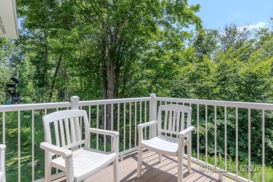 Discover your dream ski getaway in this 2-story, end-unit on Crystal Mountain Golf Course in Michigan - for sale on GolfHomes.com, golf home, golf lot