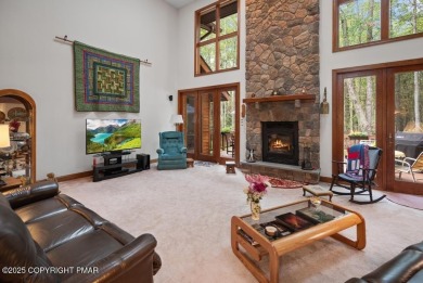 This stunning 3,000 plus square foot house in gated Timber on Lake Naomi Timber Trails Golf Club in Pennsylvania - for sale on GolfHomes.com, golf home, golf lot