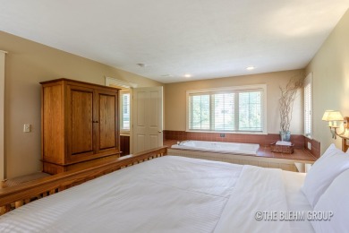 Discover your dream ski getaway in this 2-story, end-unit on Crystal Mountain Golf Course in Michigan - for sale on GolfHomes.com, golf home, golf lot