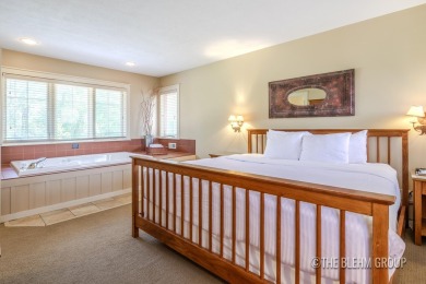 Discover your dream ski getaway in this 2-story, end-unit on Crystal Mountain Golf Course in Michigan - for sale on GolfHomes.com, golf home, golf lot
