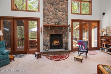 This stunning 3,000 plus square foot house in gated Timber on Lake Naomi Timber Trails Golf Club in Pennsylvania - for sale on GolfHomes.com, golf home, golf lot