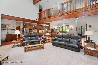 This stunning 3,000 plus square foot house in gated Timber on Lake Naomi Timber Trails Golf Club in Pennsylvania - for sale on GolfHomes.com, golf home, golf lot
