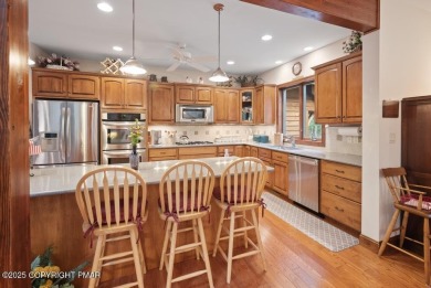 This stunning 3,000 plus square foot house in gated Timber on Lake Naomi Timber Trails Golf Club in Pennsylvania - for sale on GolfHomes.com, golf home, golf lot