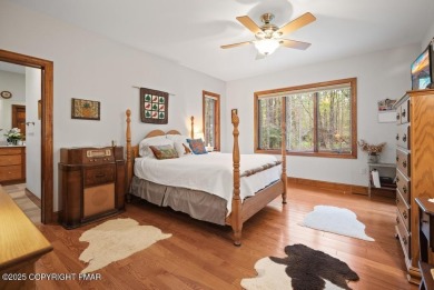 This stunning 3,000 plus square foot house in gated Timber on Lake Naomi Timber Trails Golf Club in Pennsylvania - for sale on GolfHomes.com, golf home, golf lot