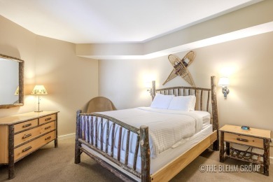 Discover your dream ski getaway in this 2-story, end-unit on Crystal Mountain Golf Course in Michigan - for sale on GolfHomes.com, golf home, golf lot