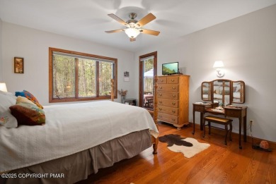 This stunning 3,000 plus square foot house in gated Timber on Lake Naomi Timber Trails Golf Club in Pennsylvania - for sale on GolfHomes.com, golf home, golf lot