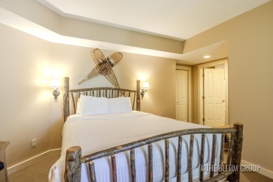 Discover your dream ski getaway in this 2-story, end-unit on Crystal Mountain Golf Course in Michigan - for sale on GolfHomes.com, golf home, golf lot