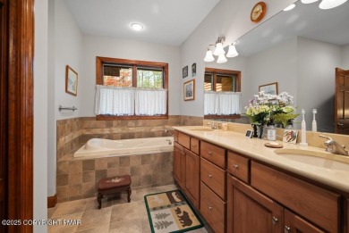 This stunning 3,000 plus square foot house in gated Timber on Lake Naomi Timber Trails Golf Club in Pennsylvania - for sale on GolfHomes.com, golf home, golf lot