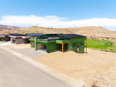 Discover the epitome of low-maintenance luxury in this stunning on The Golf Club At Redlands Mesa in Colorado - for sale on GolfHomes.com, golf home, golf lot
