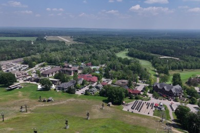 Discover your dream ski getaway in this 2-story, end-unit on Crystal Mountain Golf Course in Michigan - for sale on GolfHomes.com, golf home, golf lot