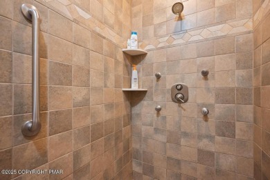 This stunning 3,000 plus square foot house in gated Timber on Lake Naomi Timber Trails Golf Club in Pennsylvania - for sale on GolfHomes.com, golf home, golf lot