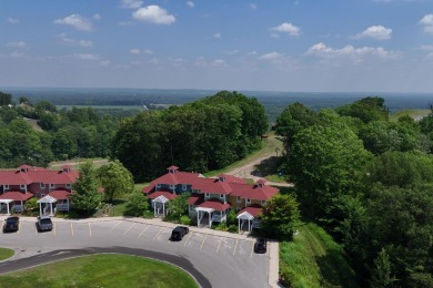 Discover your dream ski getaway in this 2-story, end-unit on Crystal Mountain Golf Course in Michigan - for sale on GolfHomes.com, golf home, golf lot