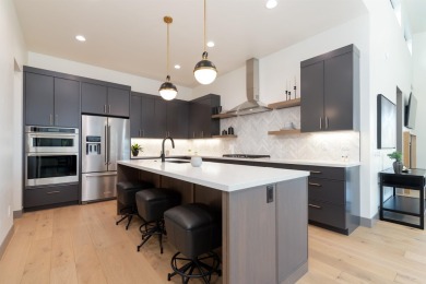 Discover the epitome of low-maintenance luxury in this stunning on The Golf Club At Redlands Mesa in Colorado - for sale on GolfHomes.com, golf home, golf lot