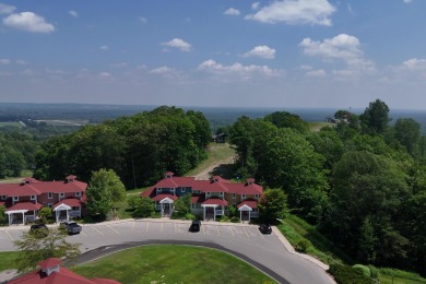Discover your dream ski getaway in this 2-story, end-unit on Crystal Mountain Golf Course in Michigan - for sale on GolfHomes.com, golf home, golf lot