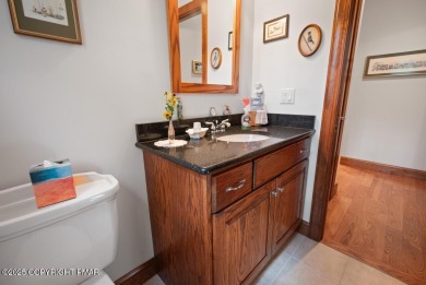 This stunning 3,000 plus square foot house in gated Timber on Lake Naomi Timber Trails Golf Club in Pennsylvania - for sale on GolfHomes.com, golf home, golf lot