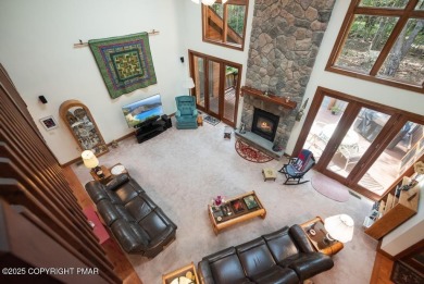 This stunning 3,000 plus square foot house in gated Timber on Lake Naomi Timber Trails Golf Club in Pennsylvania - for sale on GolfHomes.com, golf home, golf lot