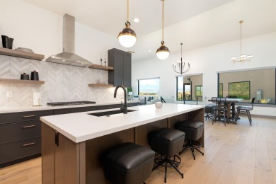 Discover the epitome of low-maintenance luxury in this stunning on The Golf Club At Redlands Mesa in Colorado - for sale on GolfHomes.com, golf home, golf lot