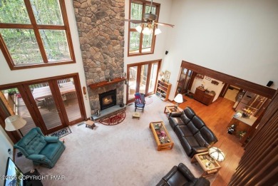 This stunning 3,000 plus square foot house in gated Timber on Lake Naomi Timber Trails Golf Club in Pennsylvania - for sale on GolfHomes.com, golf home, golf lot