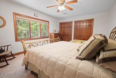 This stunning 3,000 plus square foot house in gated Timber on Lake Naomi Timber Trails Golf Club in Pennsylvania - for sale on GolfHomes.com, golf home, golf lot