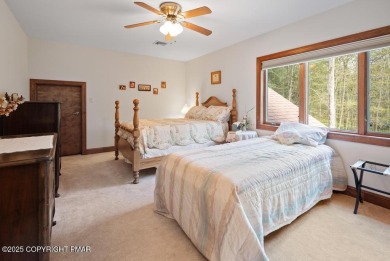 This stunning 3,000 plus square foot house in gated Timber on Lake Naomi Timber Trails Golf Club in Pennsylvania - for sale on GolfHomes.com, golf home, golf lot