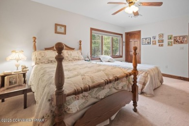 This stunning 3,000 plus square foot house in gated Timber on Lake Naomi Timber Trails Golf Club in Pennsylvania - for sale on GolfHomes.com, golf home, golf lot