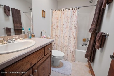 This stunning 3,000 plus square foot house in gated Timber on Lake Naomi Timber Trails Golf Club in Pennsylvania - for sale on GolfHomes.com, golf home, golf lot
