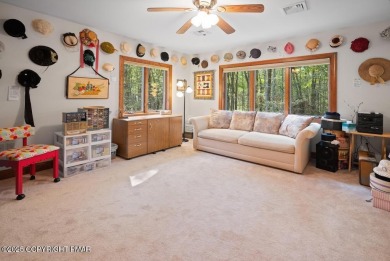 This stunning 3,000 plus square foot house in gated Timber on Lake Naomi Timber Trails Golf Club in Pennsylvania - for sale on GolfHomes.com, golf home, golf lot
