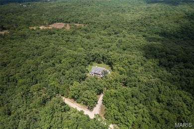 Remarkable estate in the country but still located within the on Terre Du Lac Golf and Country Club in Missouri - for sale on GolfHomes.com, golf home, golf lot