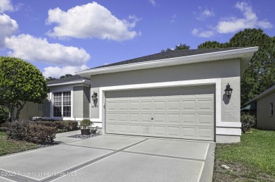 Such a beautiful home to enjoy from the gorgeous front door, and on Glen Lakes Country Club in Florida - for sale on GolfHomes.com, golf home, golf lot