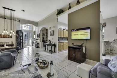 Such a beautiful home to enjoy from the gorgeous front door, and on Glen Lakes Country Club in Florida - for sale on GolfHomes.com, golf home, golf lot