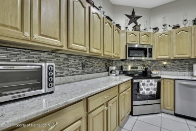 Such a beautiful home to enjoy from the gorgeous front door, and on Glen Lakes Country Club in Florida - for sale on GolfHomes.com, golf home, golf lot