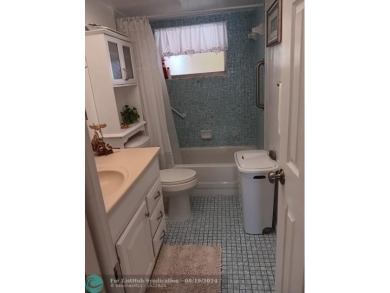 COME SEE THIS ADORABLE 1 BED /1.5 BATHS WITH 750 SQUARE FEET on Sunrise Lakes Phase III in Florida - for sale on GolfHomes.com, golf home, golf lot