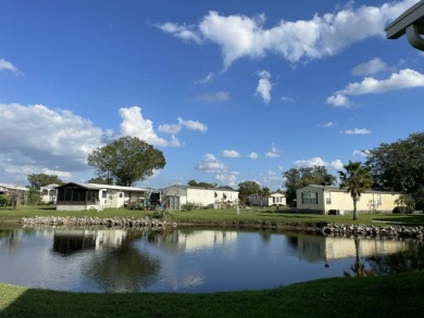 Welcome to your cozy retreat in The Lakes at CountryWood! on Golden Lakes Golf Course in Florida - for sale on GolfHomes.com, golf home, golf lot