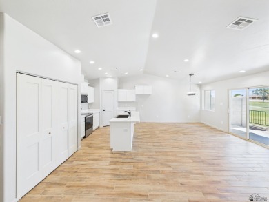 Welcome to this beautifully crafted townhome, ideally situated on Mesa Del Sol Golf Club in Arizona - for sale on GolfHomes.com, golf home, golf lot