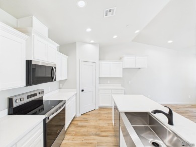 Welcome to this beautifully crafted townhome, ideally situated on Mesa Del Sol Golf Club in Arizona - for sale on GolfHomes.com, golf home, golf lot