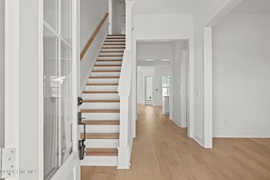 Introducing the Harper plan by Hunter Quinn Homes in the on Brunswick Plantation and Golf Resorts in North Carolina - for sale on GolfHomes.com, golf home, golf lot