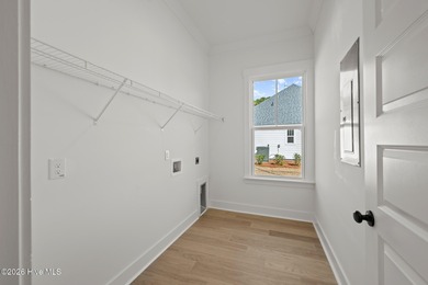 Introducing the Harper plan by Hunter Quinn Homes in the on Brunswick Plantation and Golf Resorts in North Carolina - for sale on GolfHomes.com, golf home, golf lot