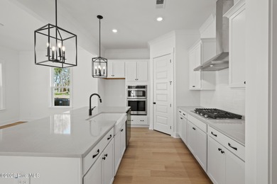 Introducing the Harper plan by Hunter Quinn Homes in the on Brunswick Plantation and Golf Resorts in North Carolina - for sale on GolfHomes.com, golf home, golf lot