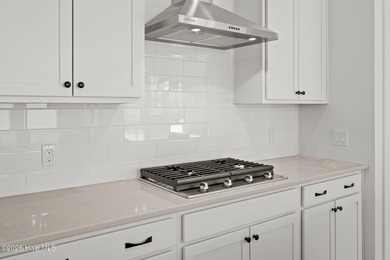 Introducing the Harper plan by Hunter Quinn Homes in the on Brunswick Plantation and Golf Resorts in North Carolina - for sale on GolfHomes.com, golf home, golf lot