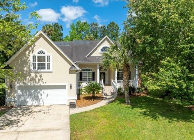 Discover this stunning traditional-style home located in the on Oak Grove Island Golf and Country Club in Georgia - for sale on GolfHomes.com, golf home, golf lot