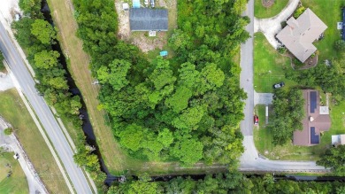 Nestled in the heart of New Smyrna Beach, this treed buildable on New Smyrna Beach Golf Course in Florida - for sale on GolfHomes.com, golf home, golf lot