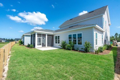 Discover refined coastal living in this thoughtfully designed on Origins Golf Club in Florida - for sale on GolfHomes.com, golf home, golf lot