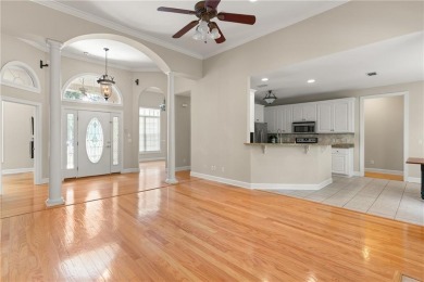 Discover this stunning traditional-style home located in the on Oak Grove Island Golf and Country Club in Georgia - for sale on GolfHomes.com, golf home, golf lot