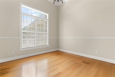 Discover this stunning traditional-style home located in the on Oak Grove Island Golf and Country Club in Georgia - for sale on GolfHomes.com, golf home, golf lot