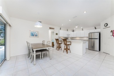 Under contract-accepting backup offers. A Poolside Retreat with on Pinemoor West Golf Club in Florida - for sale on GolfHomes.com, golf home, golf lot