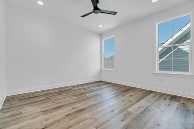 Discover refined coastal living in this thoughtfully designed on Origins Golf Club in Florida - for sale on GolfHomes.com, golf home, golf lot