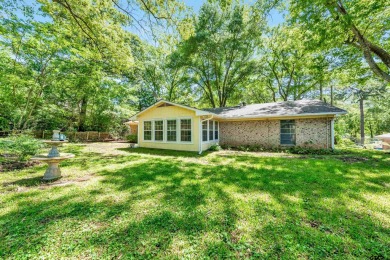 Discover your dream home in the serene and sought-after on Hide-A-Way Lake Golf Course in Texas - for sale on GolfHomes.com, golf home, golf lot