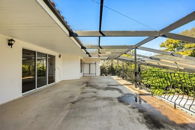 This home is located in one of Orlando's most well-known on Arnold Palmers Bay Hill Club and Lodge  in Florida - for sale on GolfHomes.com, golf home, golf lot